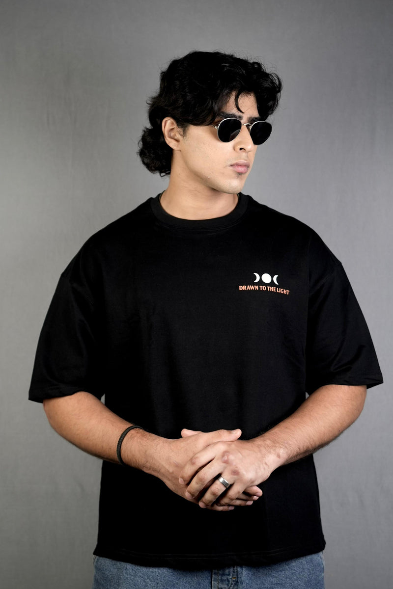 Blackout Midnight Flutter“ Black Oversized Tee